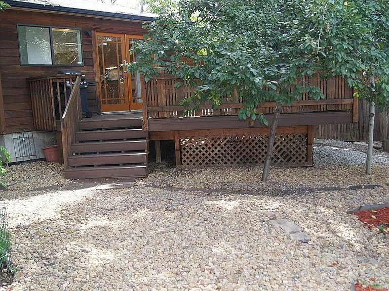 Xeriscaped fenced back yard.