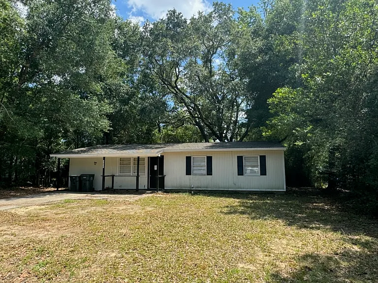 4655 Poinciana Dr — Photo 1