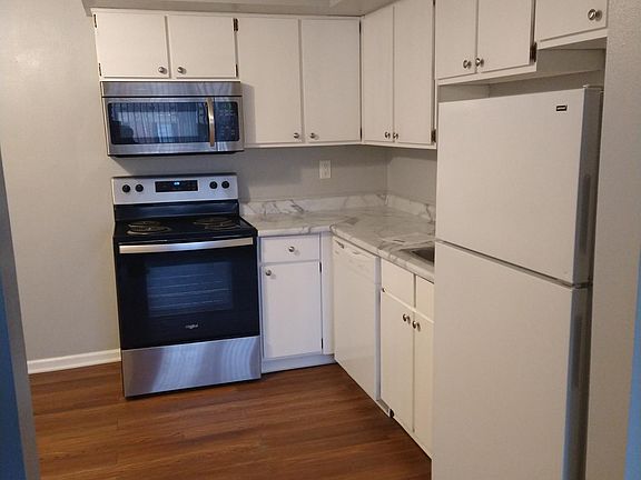 Kitchen with new oven and new microwave