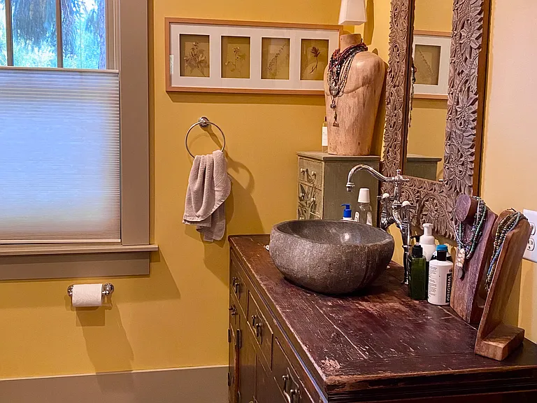 Primary bathroom. Not pictured: tile shower and toilet.