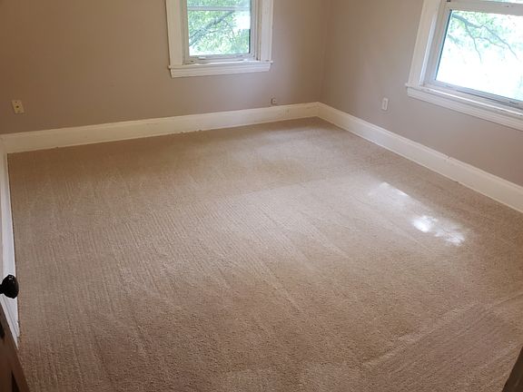 Bedroom with new carpet