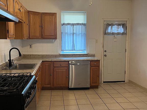 Modern kitchen with standard appliances.