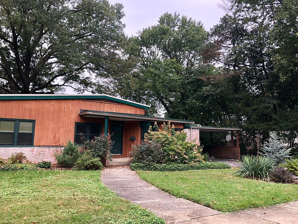Front exterior; carport.