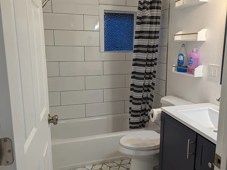 Bathroom, full sized tub, all brand new.