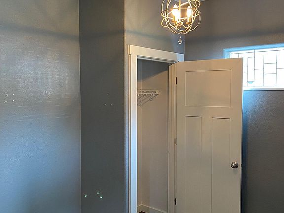 coat closet opposite the front door