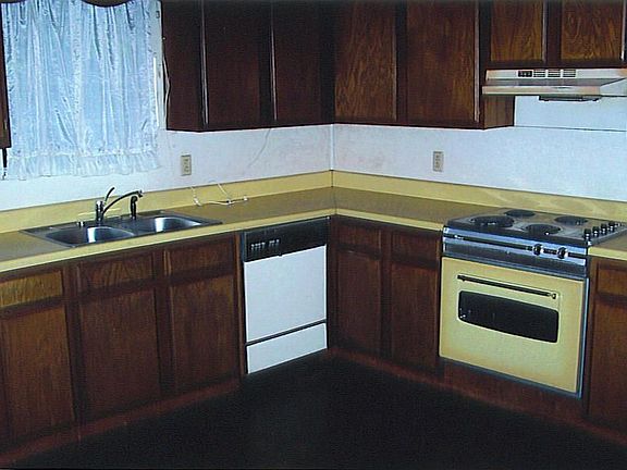 The kitchen has enough room for the whole family to get cooking.