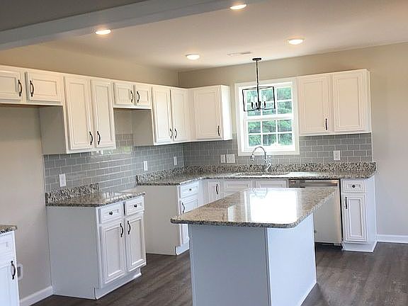 Subway tile, granite, island