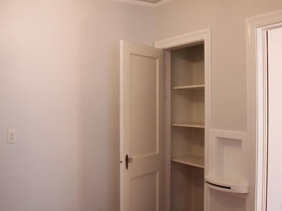 Dining room with storage closet and telephone nook