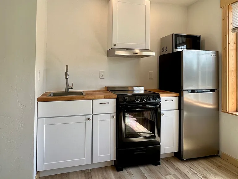 Ski Town Apartments — Photo 11