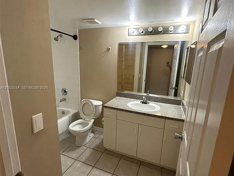 5035 Wiles Rd #203 — Photo 11