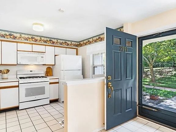 Front Door and Kitchen