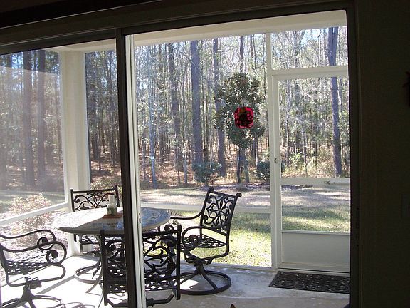 Porch and wooded yard