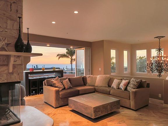 Accordion doors open to the Pacific