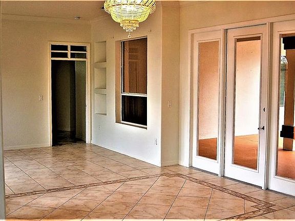 Entrance/ Right of front door (Walk straight through to access lanai)