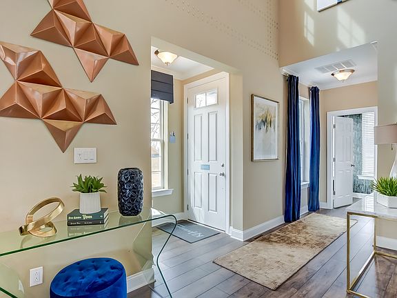 Foyer with coat closet and powder