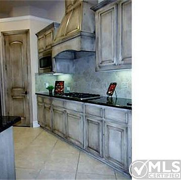Builtin microwave, gas cook top, under cabinet lighting and walk