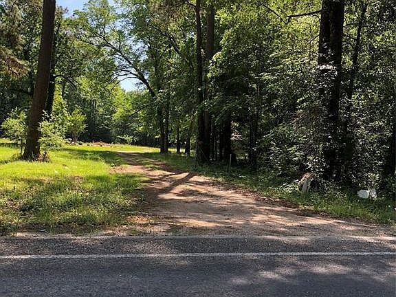 Entrance to land.  2 front acres cleared.