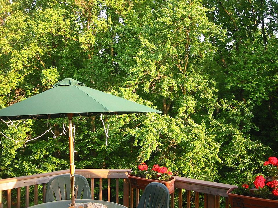 Deck backing to woods with Exercise Trail