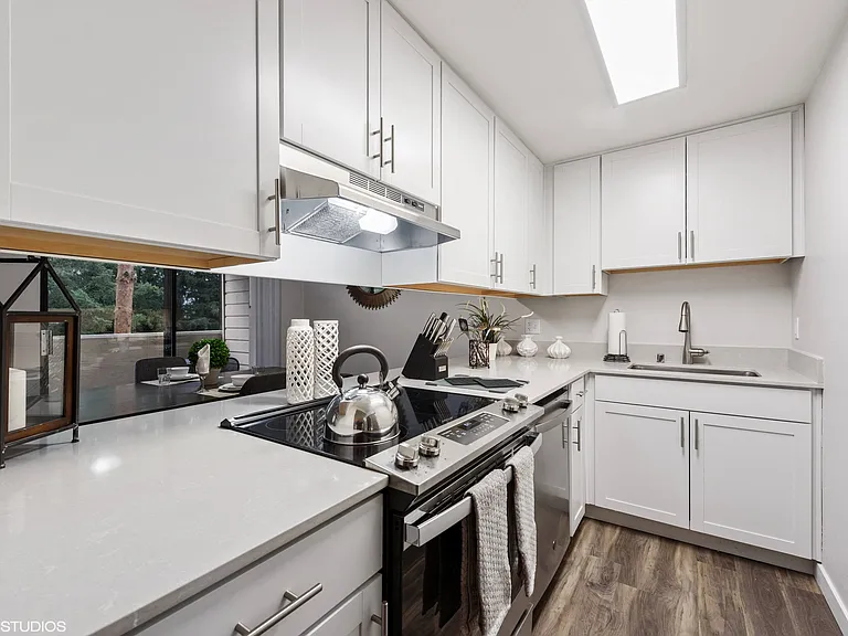 White Cabinets, Quarts Counter-tops