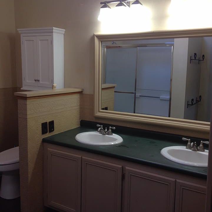 Bathroom with skylight, large shower and double sink