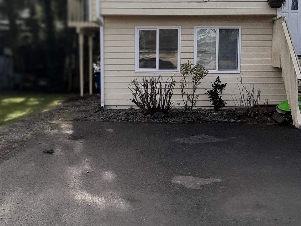 There are two parking spaces in front of the unit.