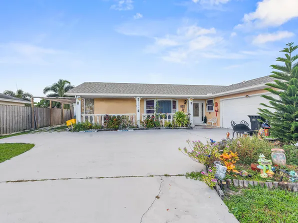 2044 SW Idaho Lane, Port St Lucie, FL 34953
