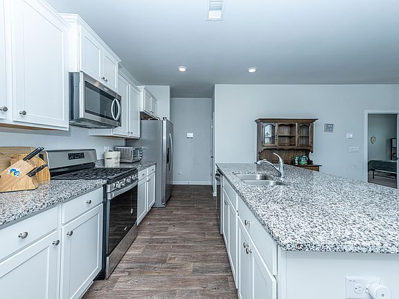 5th image of 100 Blossom Wood Ln