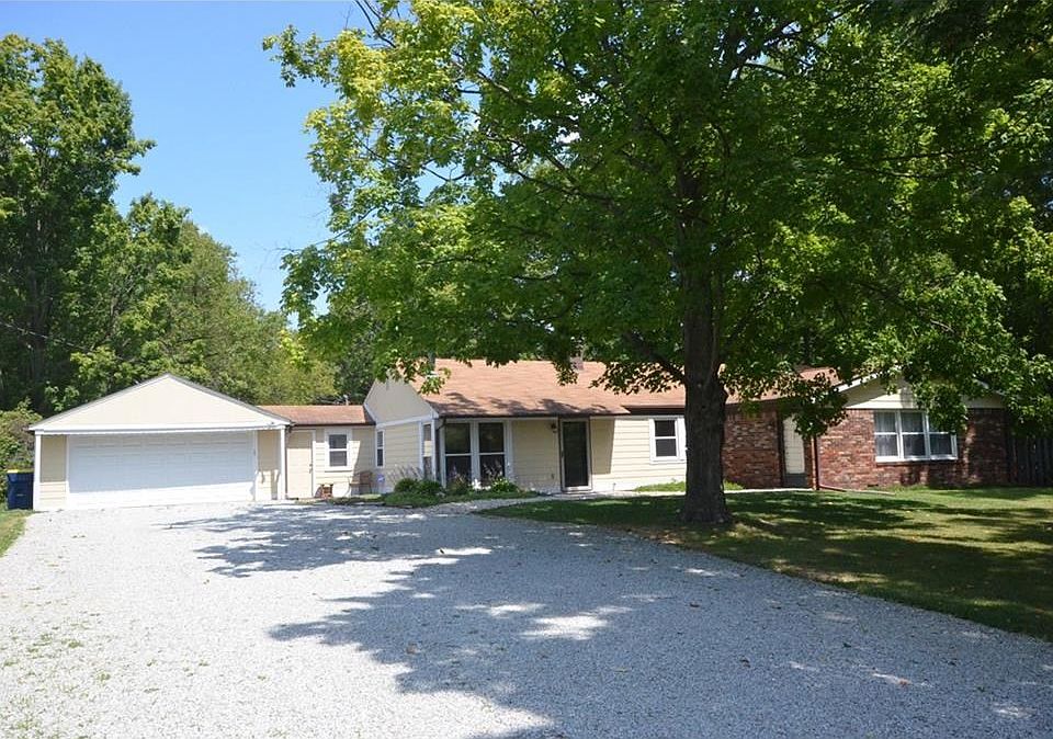 This ranch style home sits back on the lot, giving it a large front yard.