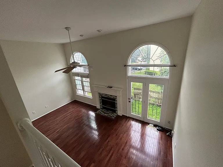 Looking at the living room from the landing of the upstairs