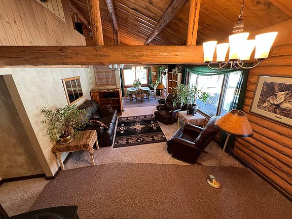 Living room and dining room from upper stairs.