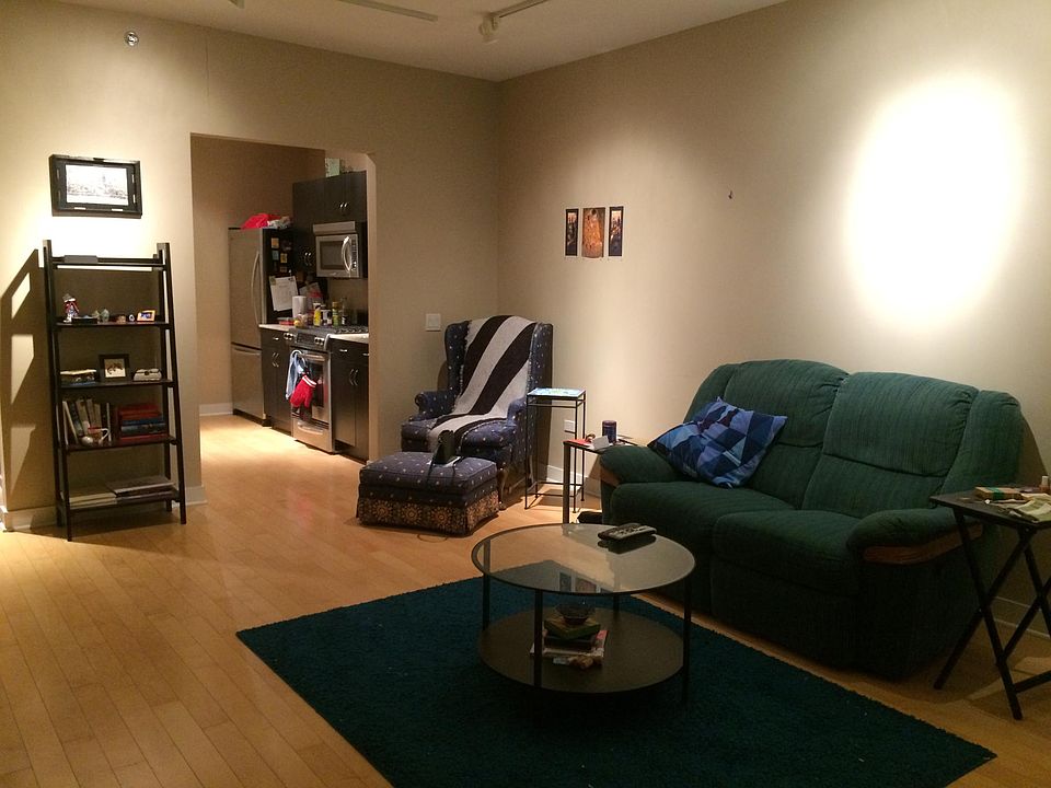 Large, semi-furnished living/dining with adjoining balcony f