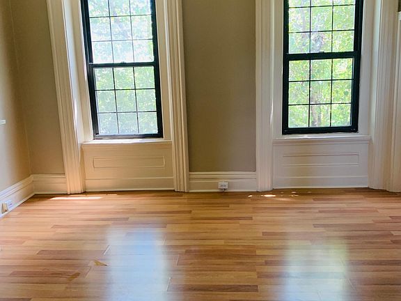 Bedroom with large windows