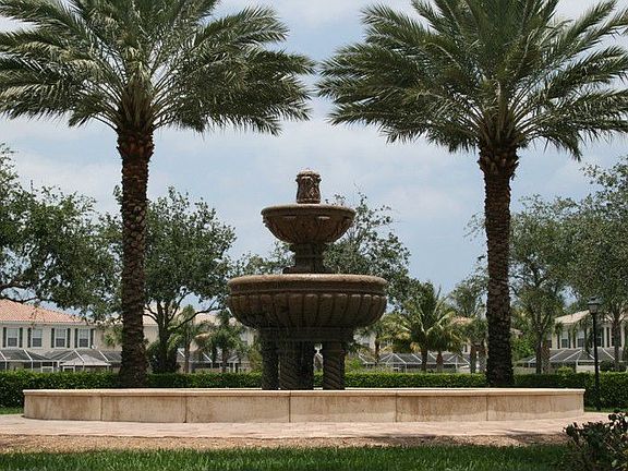 Beautiful fountain welcomes you home at the community entrance.