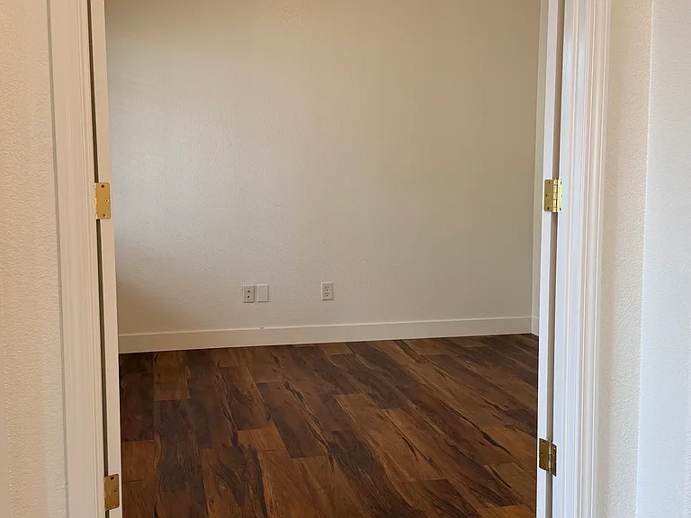 Living room looking towards 3rd bedroom / den