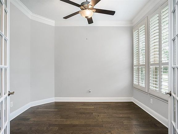 Study with double doors and tons of natural light