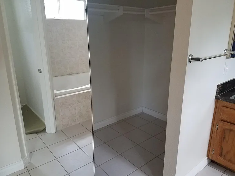 Walk in closet in master bedroom