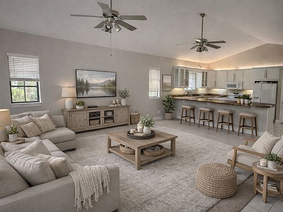 family room open concept to kitchen, dual overhead fans