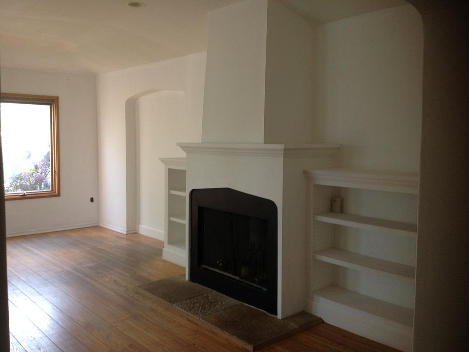 Large living room with woodburning fireplace