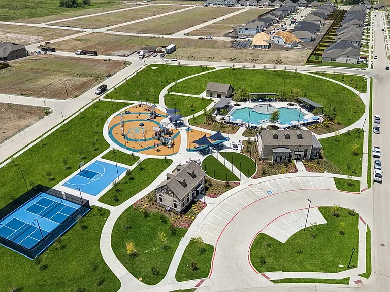 Enjoy premier community social spaces just steps away_perfect for meeting neighbors and family gatherings.