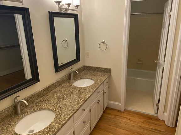 Double sink vanity off primary bedroom