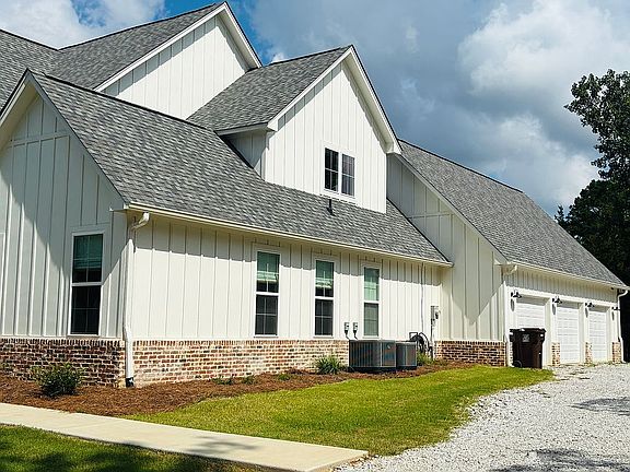 Side of house-3 car garage 
