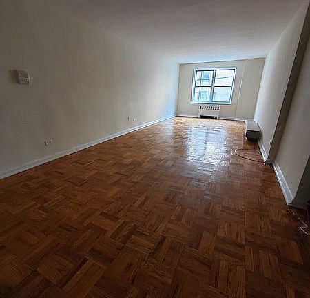 2nd image of 65-07 Booth St #1