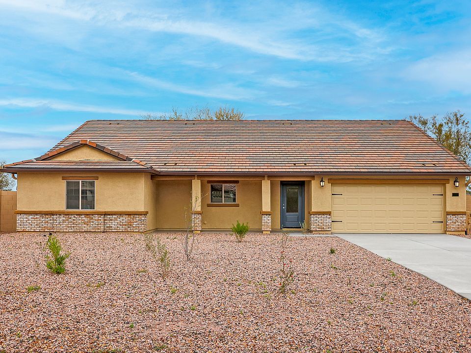 Exterior of the Willow with a large covered front porch and two-car garage.