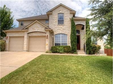 3 CAR TANDEM GARAGE. 4 Sides Stone. Corner lot.
