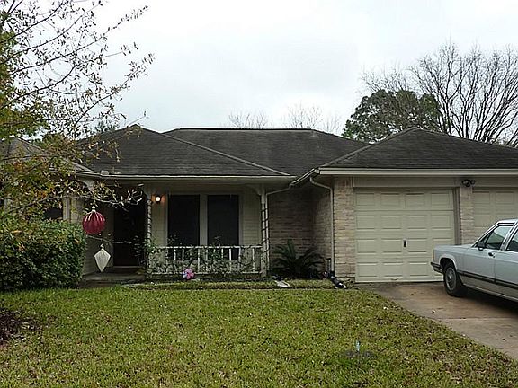 Front of home showing attached garage
