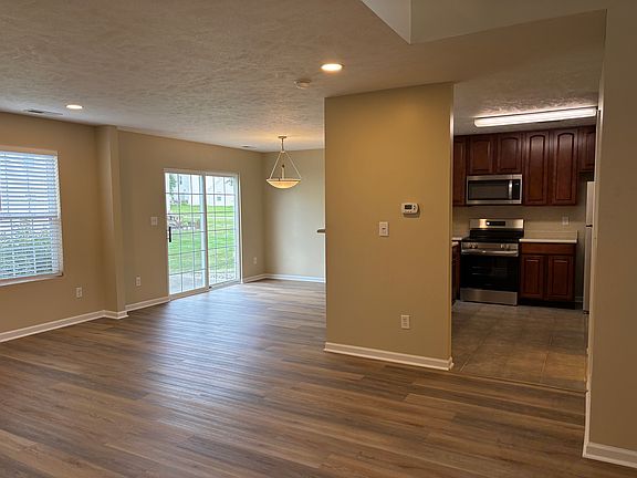 View from living area to kitchen and dining area.