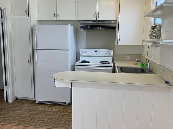 view of kitchen from front door