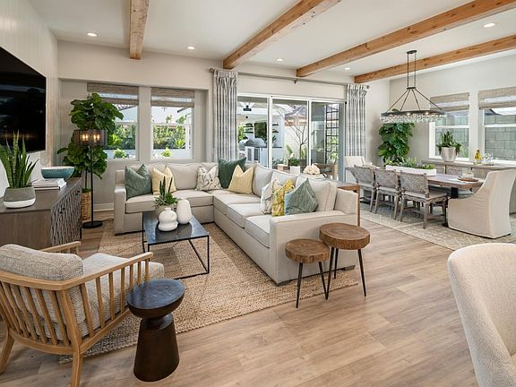 Open kitchen, great room, and casual dining space perfect for entertaining