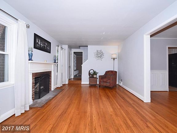 Light filled LR w/gleaming hardwood floors
