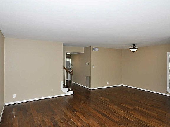 View of living and dining room looking toward the kitchen.